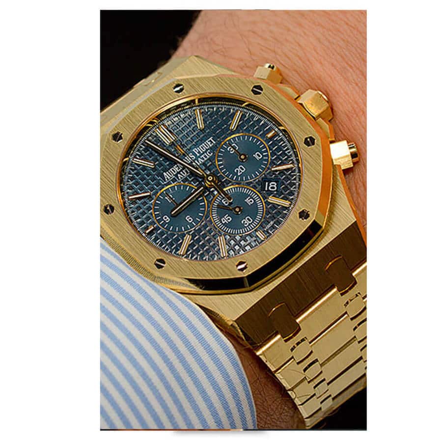 Audemars-Piguet-Gold-Royal-Oak-Blue-Arm-3 Audemars Piguet 26320BA.OO.1220BA.02 Yellow Gold Replica - Image 4